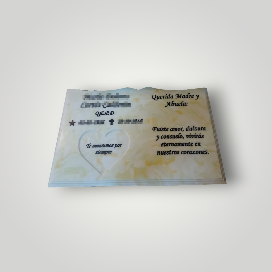 Lapida de cuarzo con diseño de libro más grabado de diseño bajo relieve.